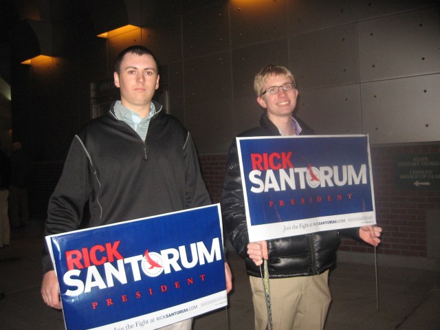 Santorum, teens w signs, 2.13.12